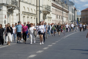 Crowd walking along Nowy Świat Street in Warsaw, Poland
